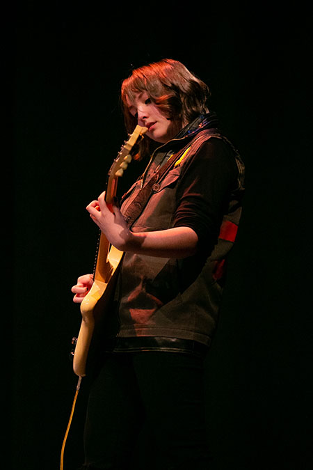 Girl playing guitar